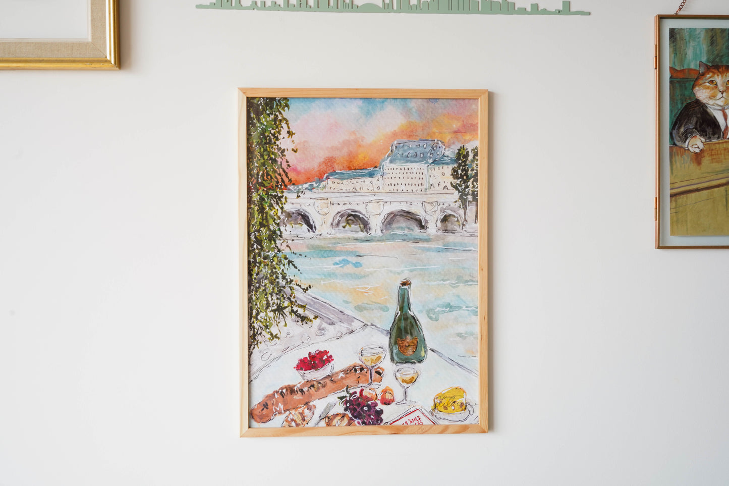 MAY - Arielle in Paris poster (Picnic along the Seine)